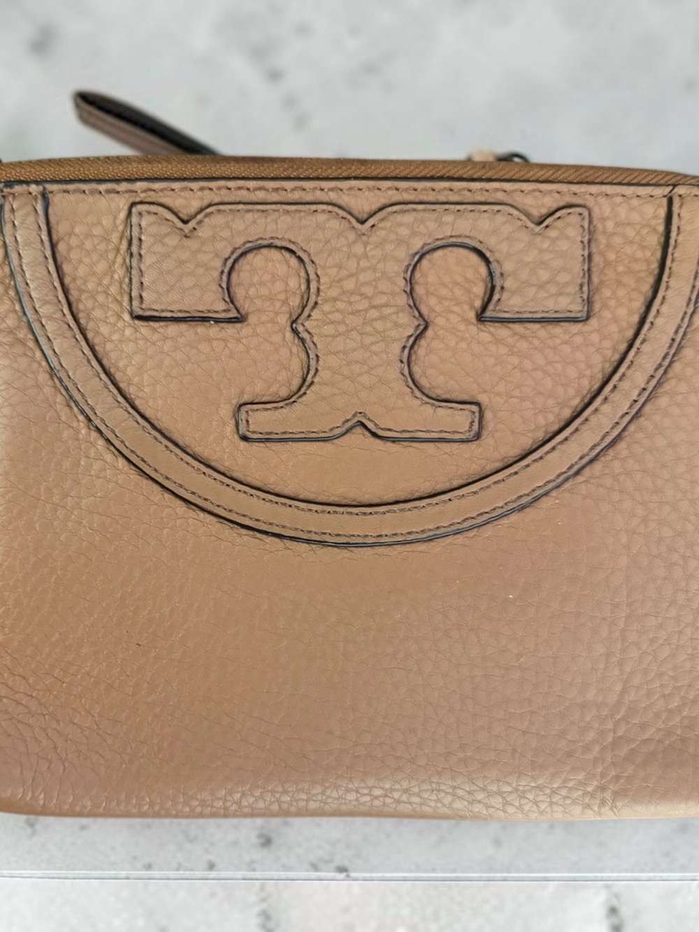 Tory Burch Pebbled Leather Zip Wristlet in Tan- Good condition and cleaned.